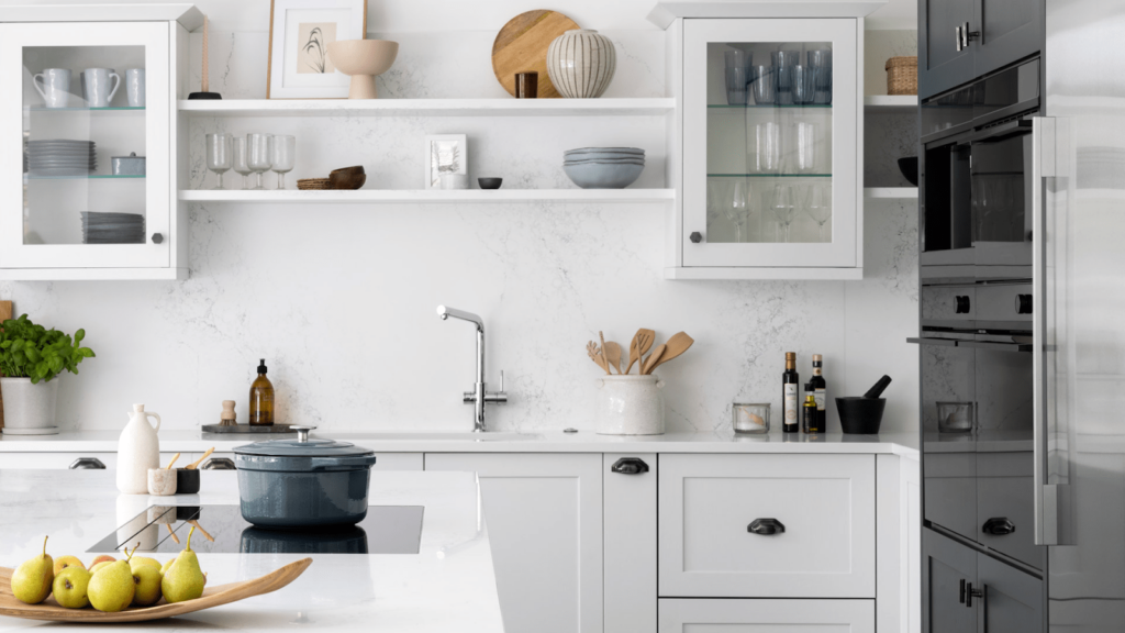 A transitional kitchen with 1141 Pure White and 5151 Empira White countertops. Photographer- Paul Craig, Designer- MILV. -min