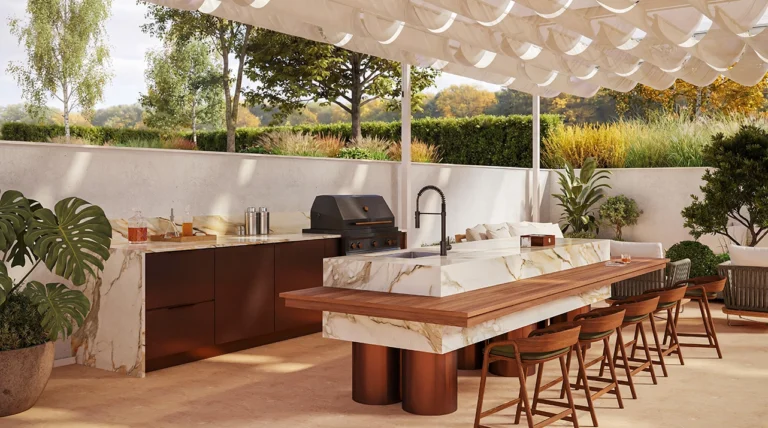 Caesarstone porcelain 536 Antikella surface in Modern outdoor kitchen with marble countertops, wooden bar stools, plants, and a built-in grill.