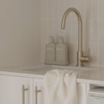 Caesarstone 5444 Lunar Frost surfaces in Ebop Building home - kitchen and bathroom