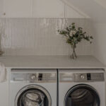 Caesarstone 5444 Lunar Frost surfaces in Ebop Building home - kitchen and bathroom