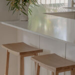 Caesarstone 5444 Lunar Frost surfaces in Ebop Building home - kitchen and bathroom
